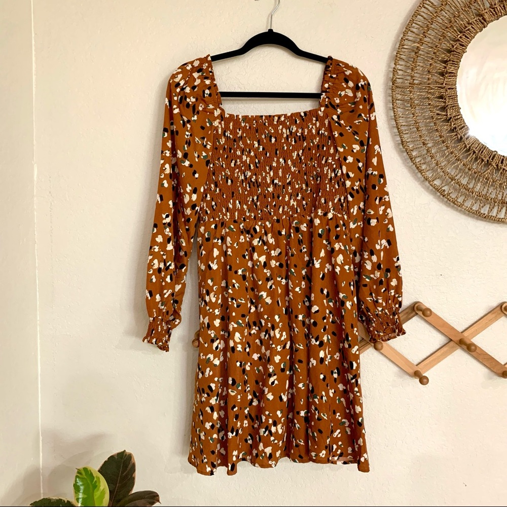 Boutique orange knee length dress with green, black, white speckles